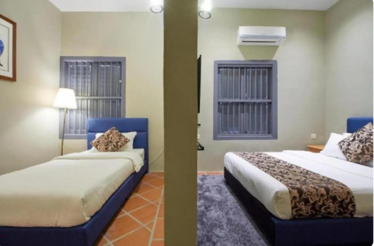 Capital O 90443 Aigoh Hotel George Town
