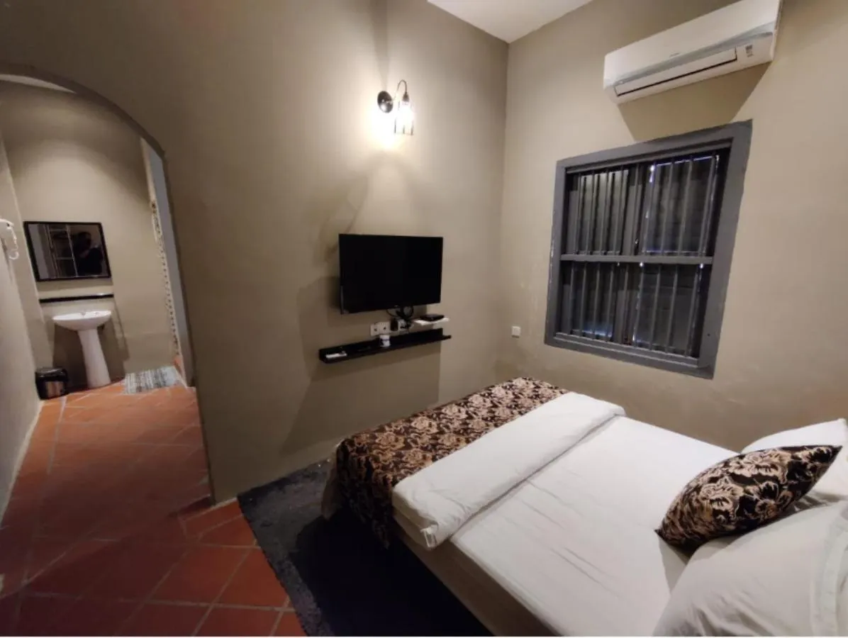 Capital O 90443 Aigoh Hotel Malajzia