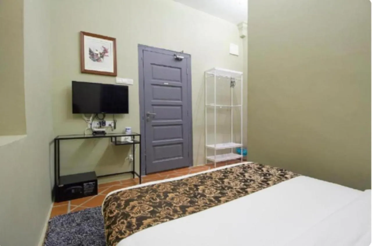 Capital O 90443 Aigoh Hotel  George Town